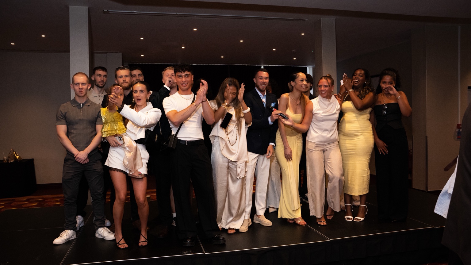 Bobs celebrating with members of his community